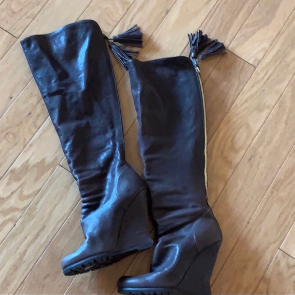 YSL brown knee high boots. Zippered with wedge heels & tassels.  Great condition